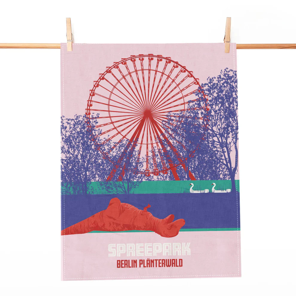 Hellrosa Geschirrtuch mit rotem Riesenrad-Motiv und Schriftzug Spreepark Berlin Plänterwald.