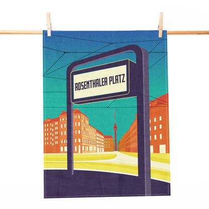 Geschirrtuch mit Illustration des U-Bahn-Eingangs Rosenthaler Platz und Berliner Stadtmotiven.
