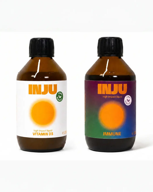 Zwei INJU-Flaschen mit den Etiketten Vitamin D3 und Immune