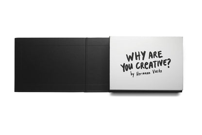Aufgeschlagenes Buch Why Are You Creative? von Hermann Vaske mit schwarzem Innenumschlag und weißem Titelblatt.